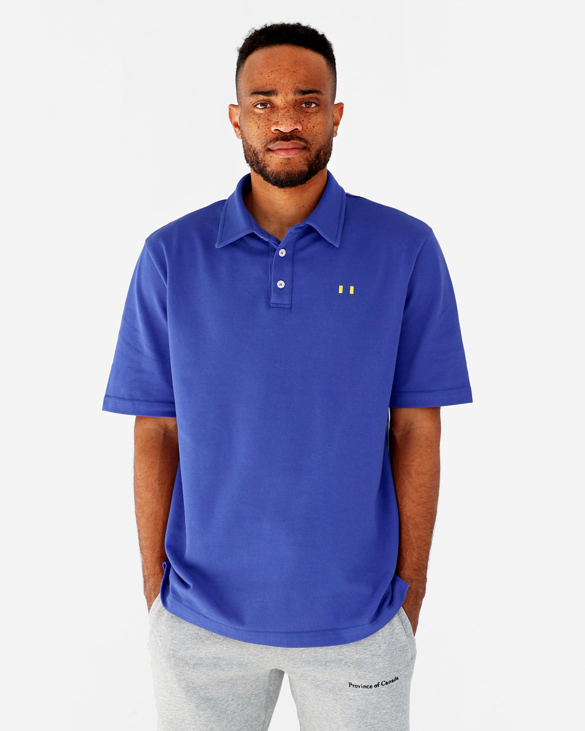 Made in Canada Flag Polo Shirt Royal Unisex - Province of Canada