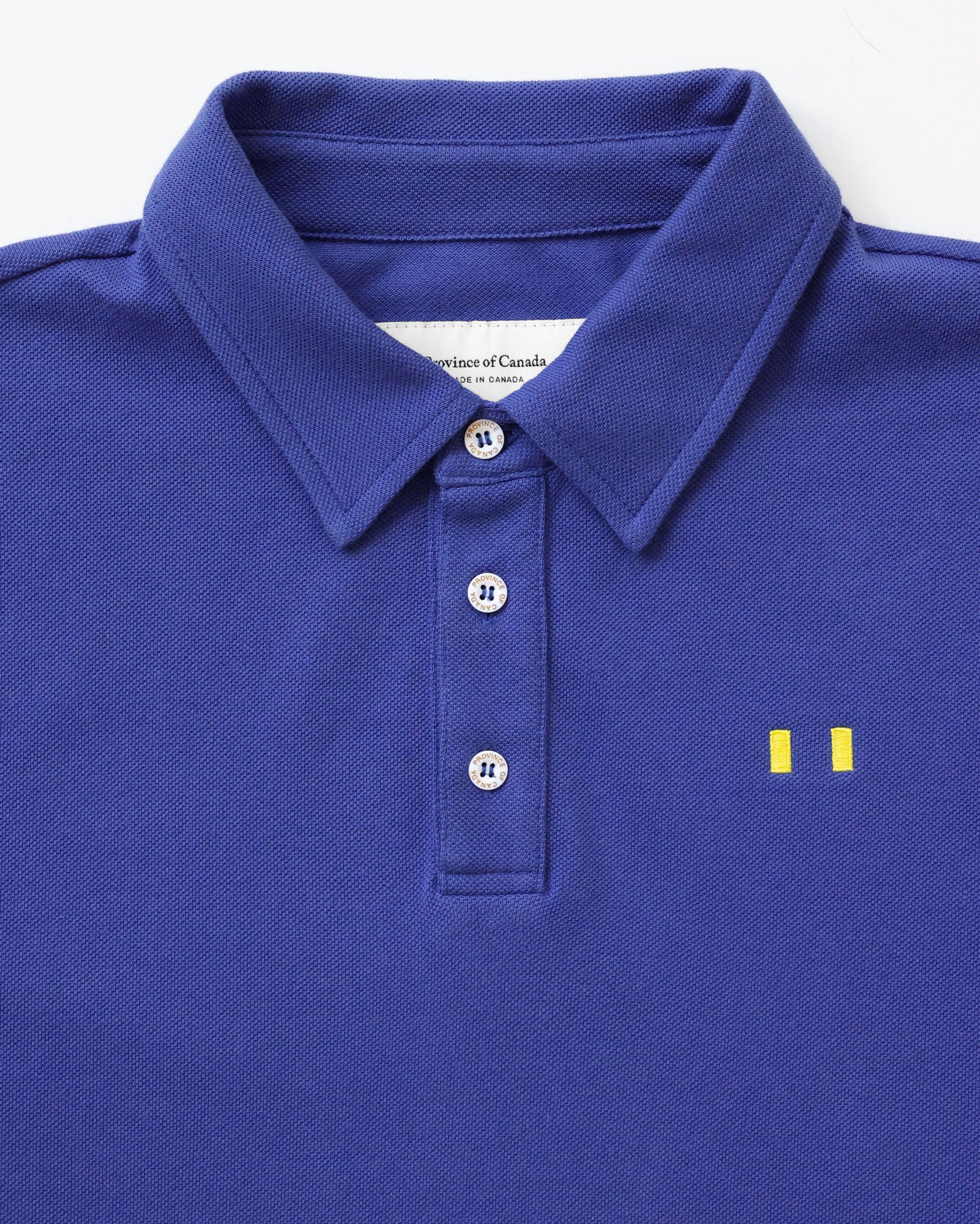 Made in Canada Flag Polo Shirt Royal Unisex - Province of Canada