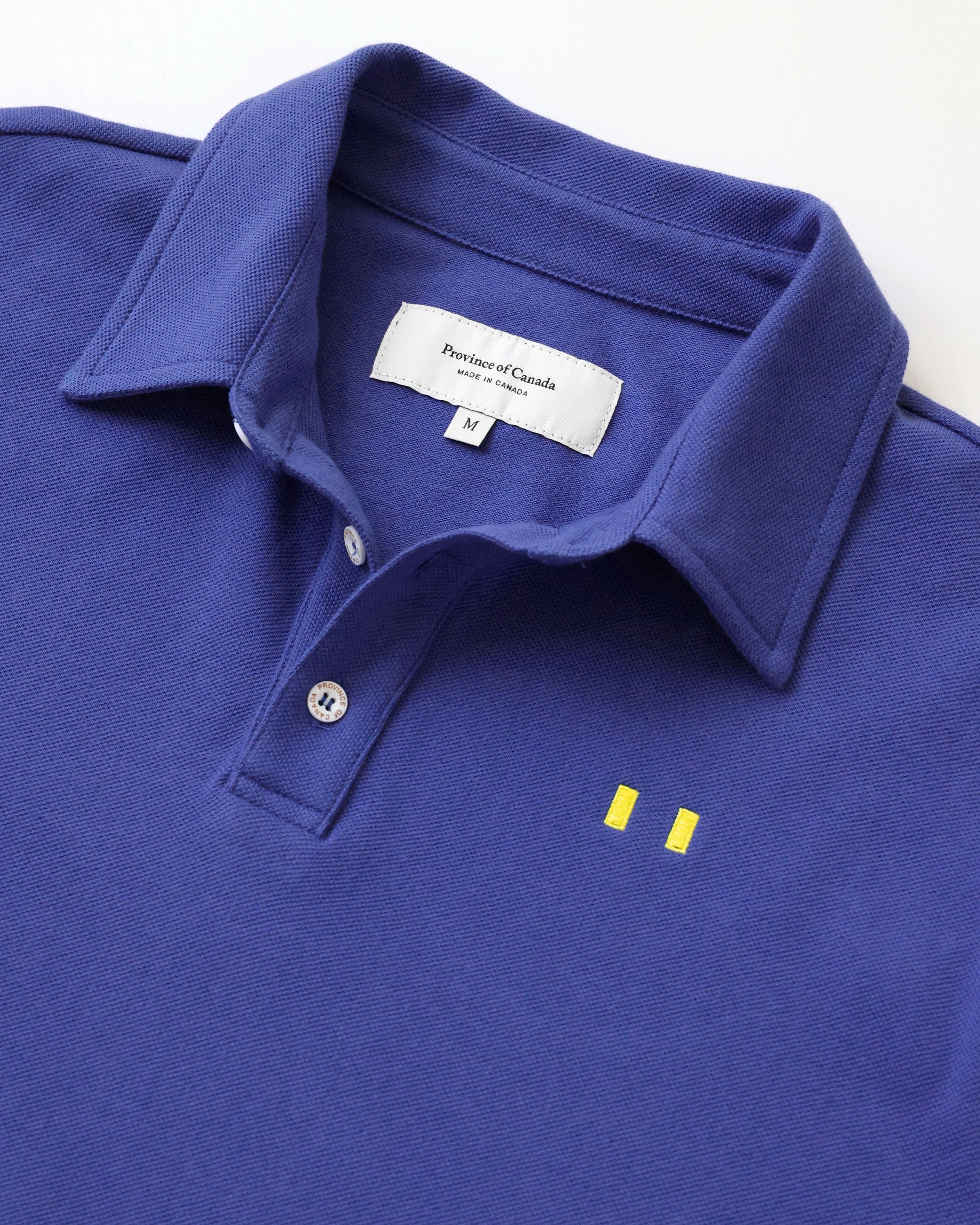 Made in Canada Flag Polo Shirt Royal Unisex - Province of Canada